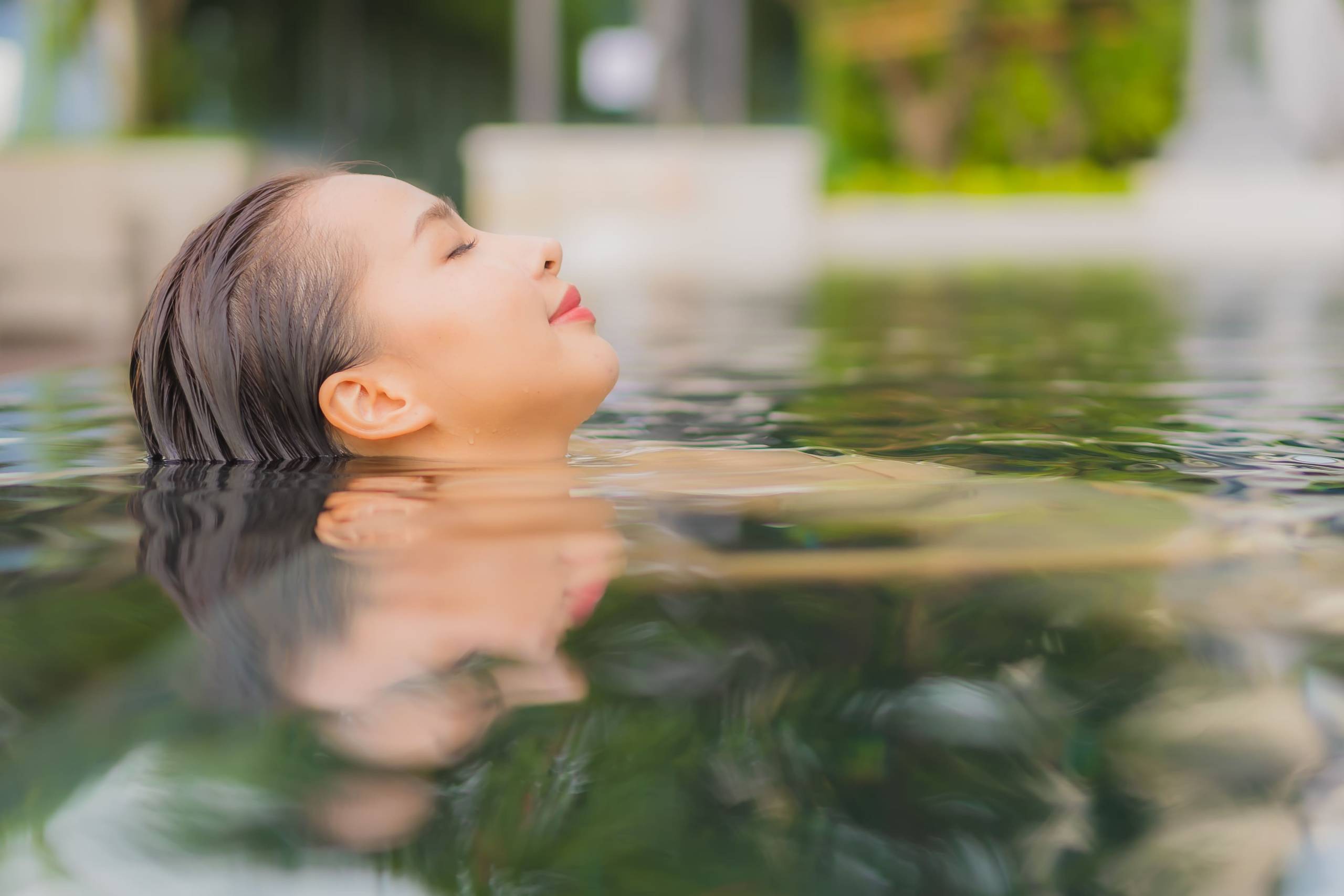 portrait-beautiful-young-asian-woman-relax-smile-around-outdoor-swimming-pool-hotel-resort-vacation-travel (1)